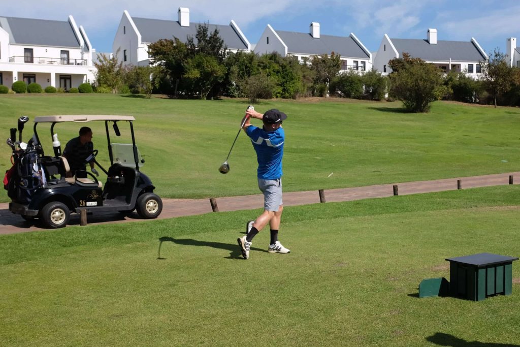 Bernd Steinhage, founder of the Young Bafana Soccer Academy, playing golf during the YB golf day.