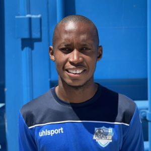 Portrait of Ishmael Nketu, staff member of the Young Bafana Soccer Academy.